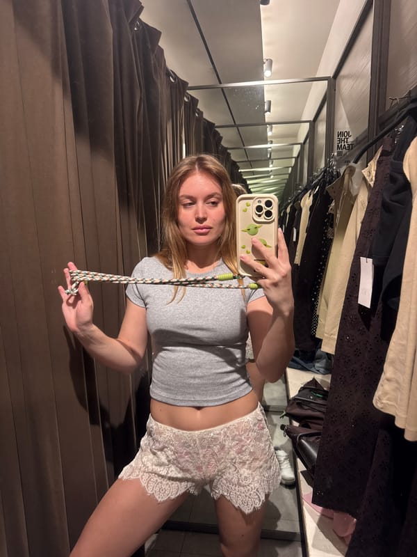 Woman takes fitting room selfie in Rome