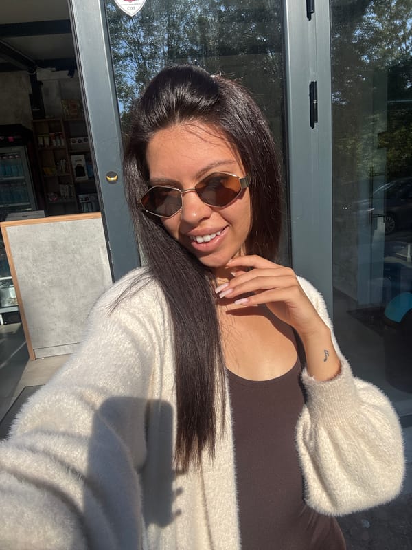 Casual selfie session on a Sofia street, coffee in hand