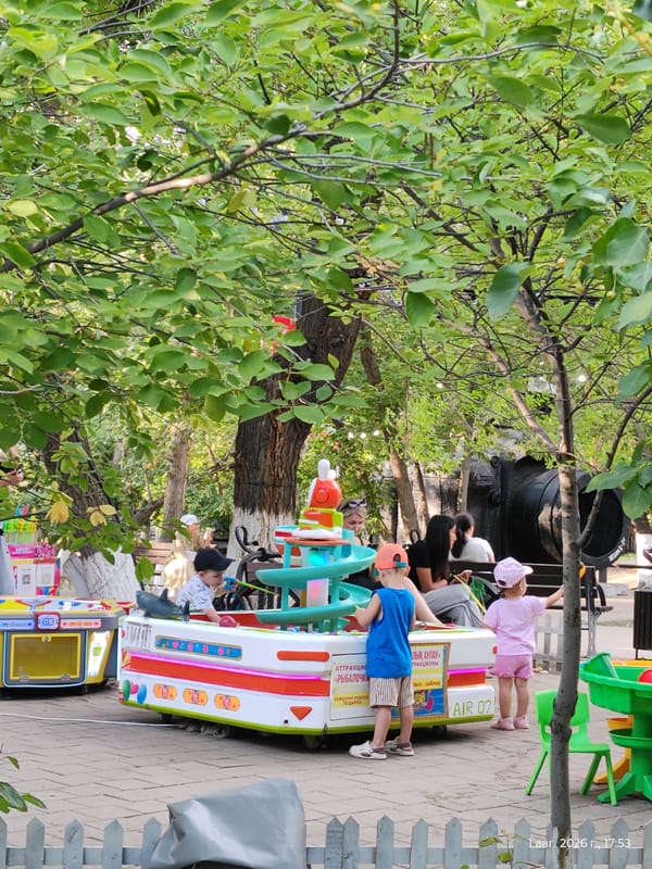 Amusement park rides and street art in Astana