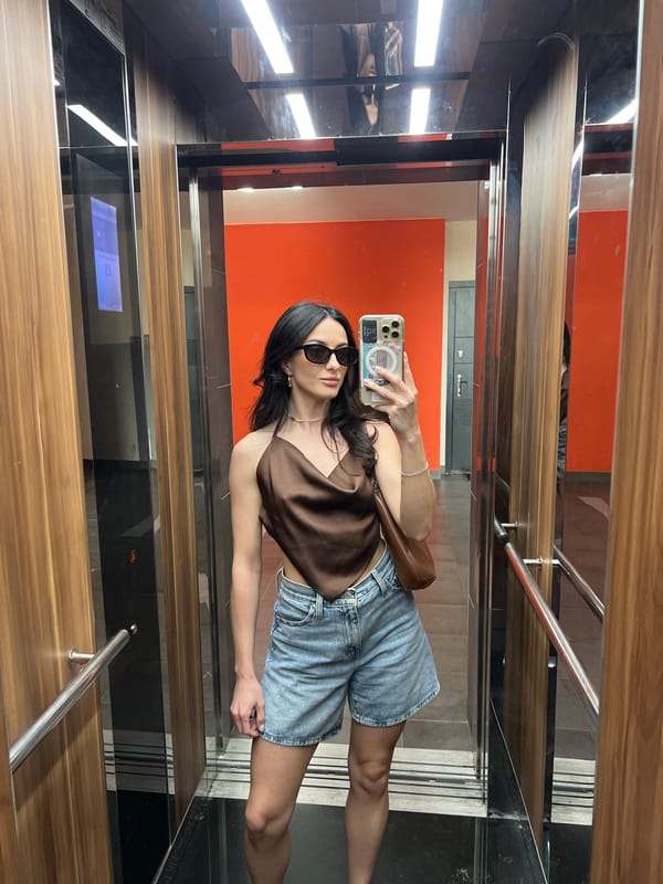 Elevator mirror selfie in a Lviv building
