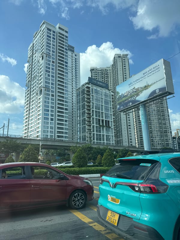 Thủ Đức's modern skyline and busy streets on a sunny morning