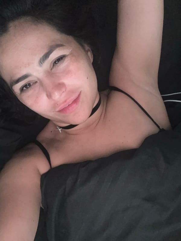 Woman resting in bed observed in Chaikovsky, Russia