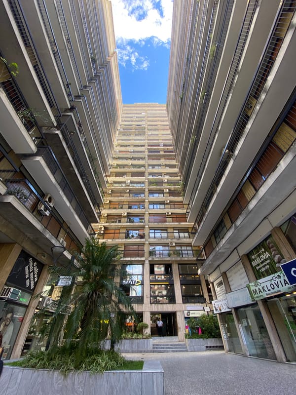 Upward architectural photography captures Buenos Aires urban canyon views