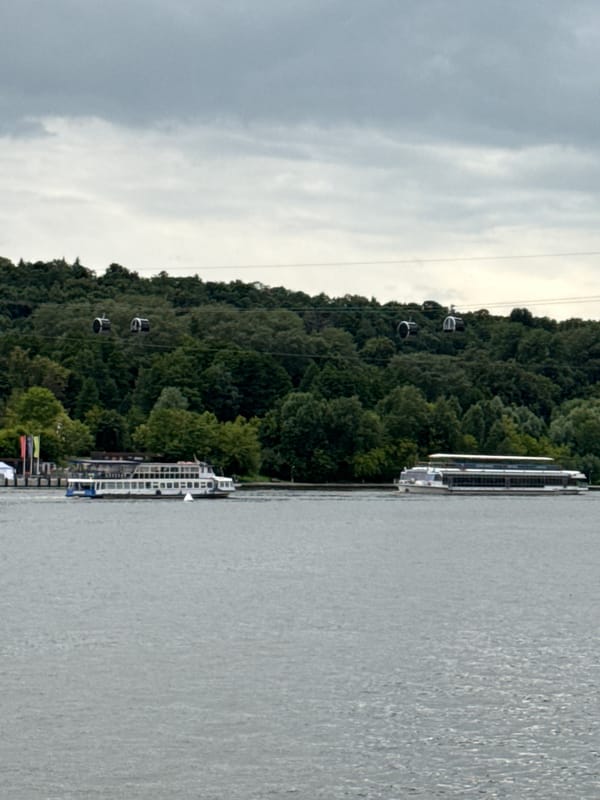 Boats, cable cars, and joggers along Moscow's Sparrow Hills waterfront