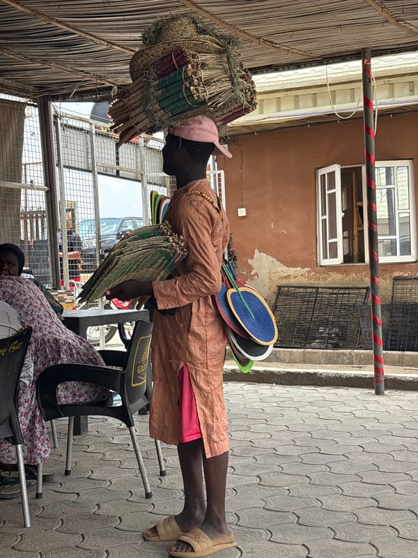 Street vendor operates in busy Abuja market area