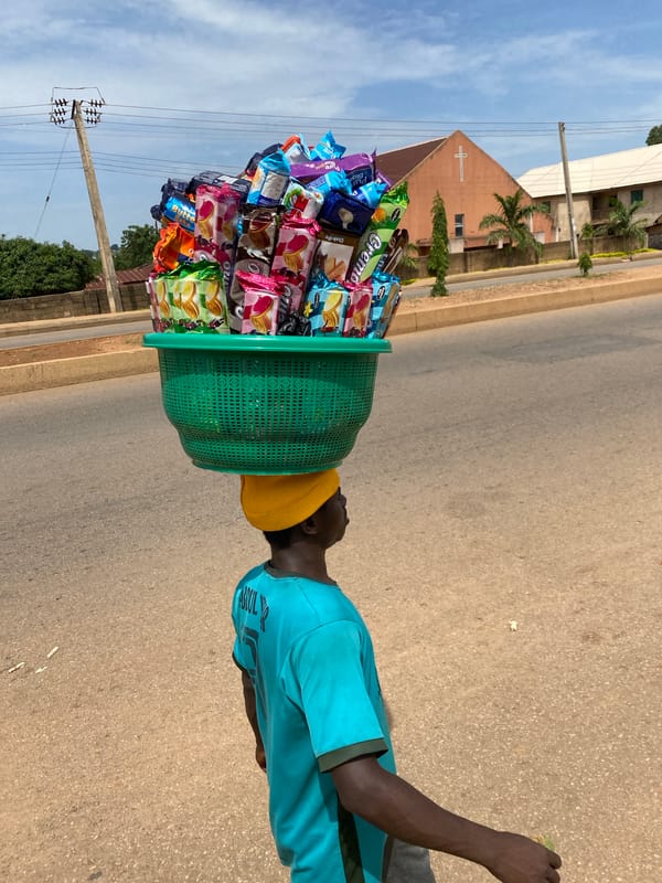 Everyday street life and movement in Bukuru, Nigeria