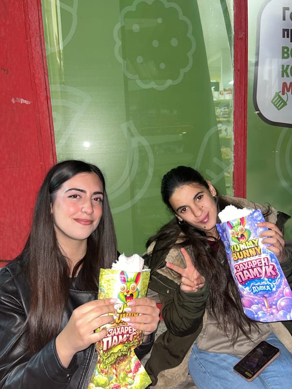 Young women buy cotton candy, withdraw cash in Sungurlare