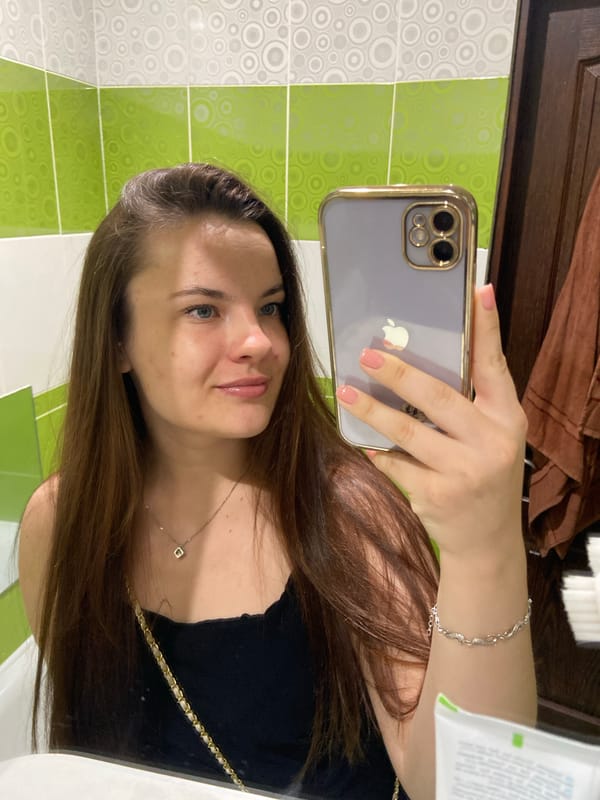 Quick selfie session across bathroom, hallway, and street in Poltava