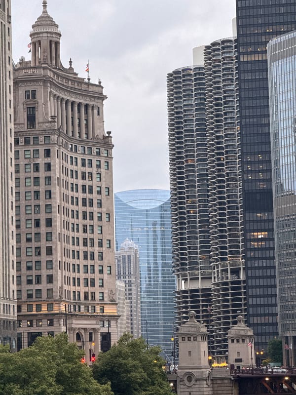 Chicago River skyline and tour boats on an overcast day