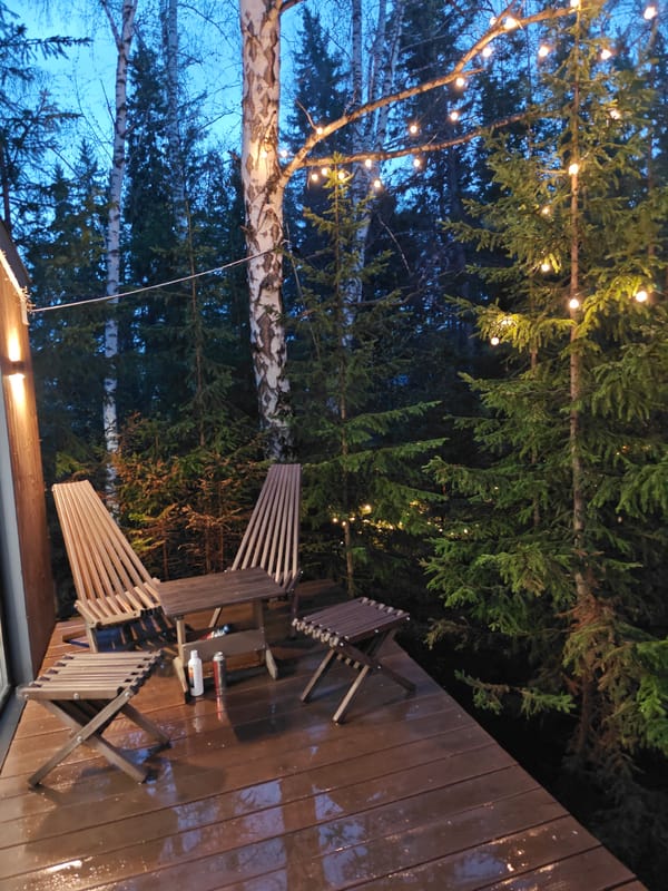 Wooden deck furniture arrangement captured in Минино, Russia