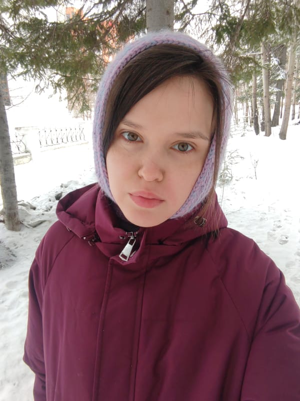 Woman takes selfie in snowy Ust-Ilimsk, Russia