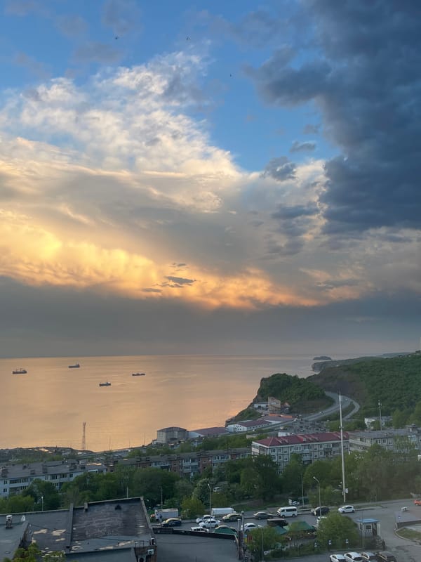 Morning moments captured in Vladivostok: cityscape and snack time