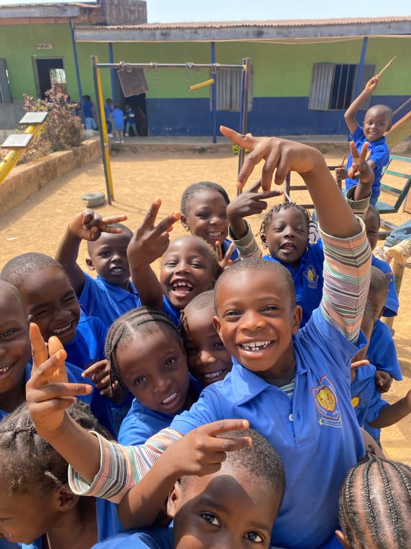 School children gather for photos in Gura Top, Nigeria