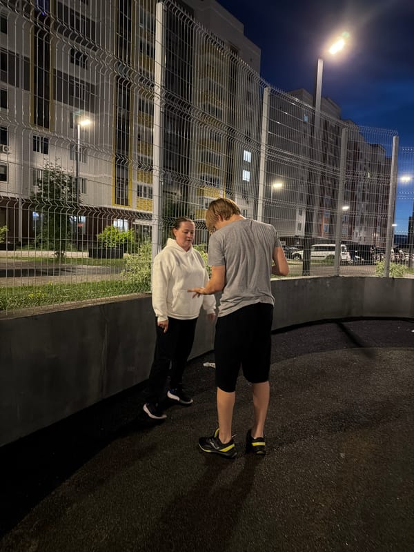 Late-night basketball tricks on a wet court in Izhevsk