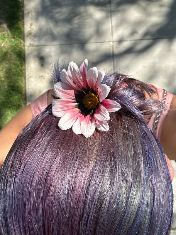 Person displays floral hair accessory in Los Angeles