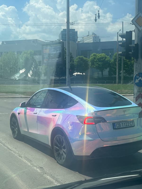 Tesla with holographic wrap spotted on city street