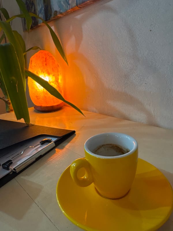 Yellow coffee cup photographed indoors in Sofia, Bulgaria