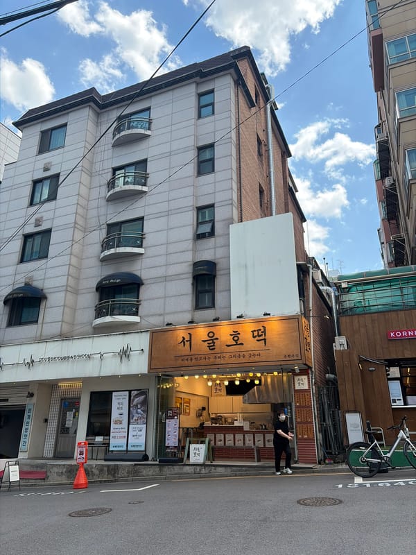 Early morning Seoul street scene captured with Korean signage