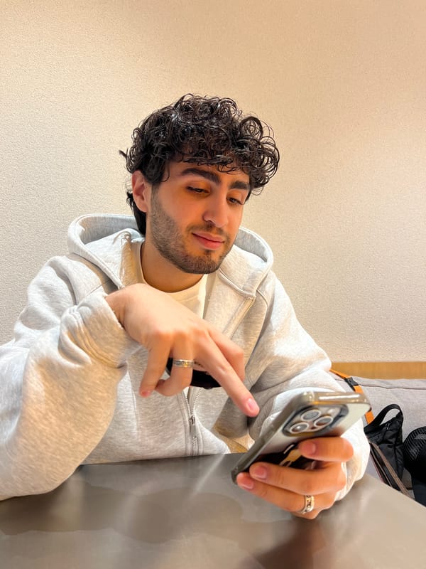 Young man documents restaurant visit through selfies in Yerevan