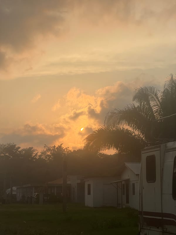 Hazy sunset observed in Punta Gorda Town, Belize