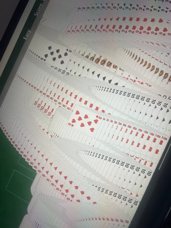 Computer user plays solitaire in Dar es-Salaam evening