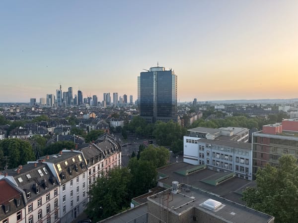 Frankfurt residents document sunset cityscape views across downtown area