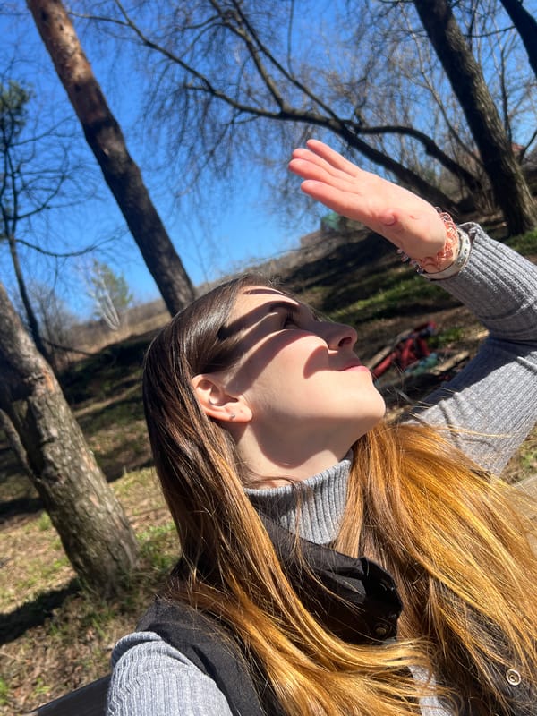 Woman photographed outdoors in Votkinsk wooded area