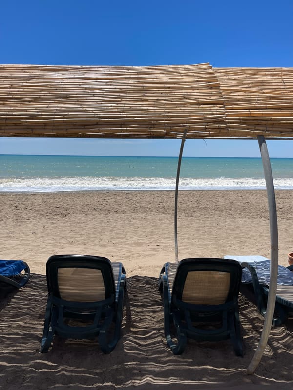 Beach day unfolds in Serik with chairs and refreshments