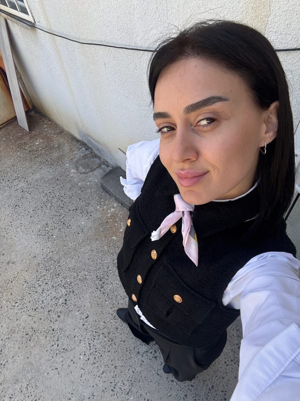 Woman conducts early morning photo session at Tbilisi café