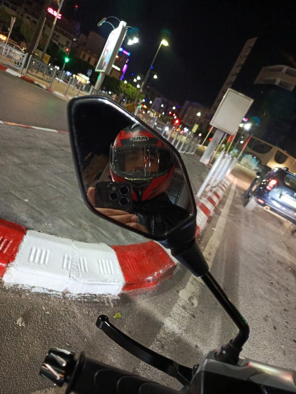 Nighttime motorcycle ride captured in Meknes, Morocco