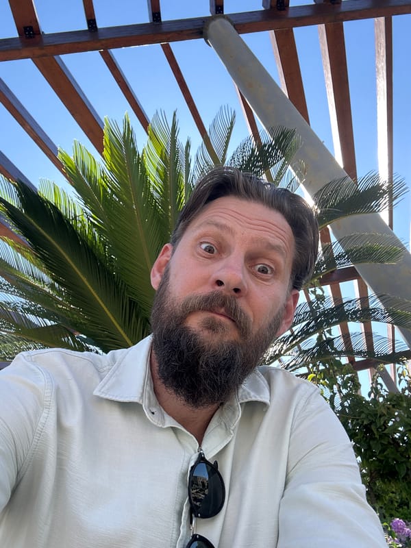 Man explores terraced outdoor venue in sunny Fethiye, Turkey