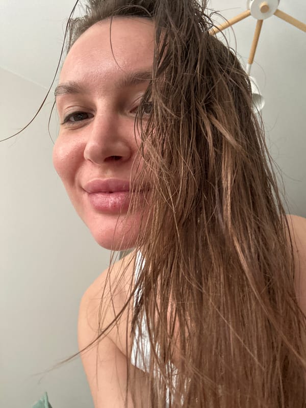 Portrait of person with wet hair photographed in Moscow