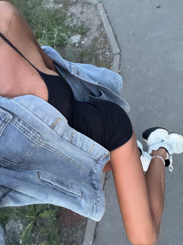 Woman films herself walking in Kazan parking area