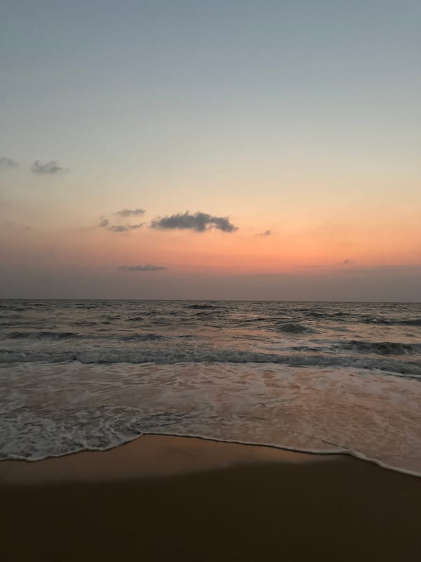 Sunset scenes and beach totem captured at Sinquerim Beach