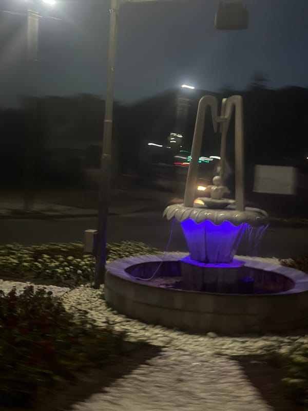 Velingrad at night: fountain and church lit up