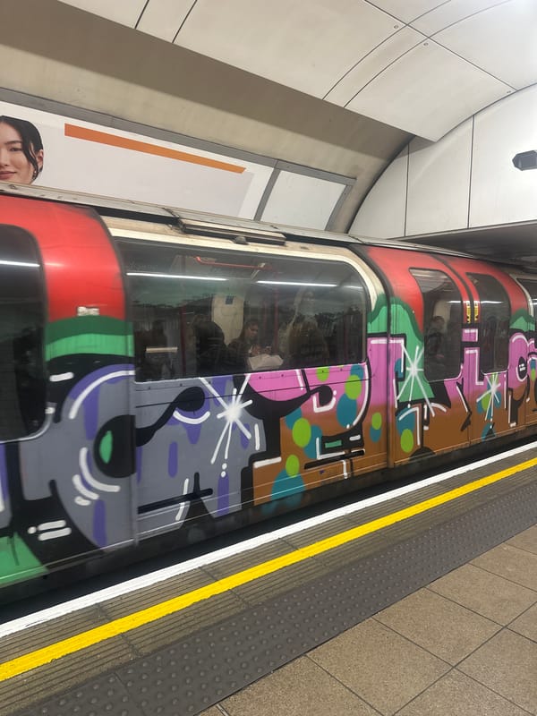 Graffiti-covered London Underground train spotted at station