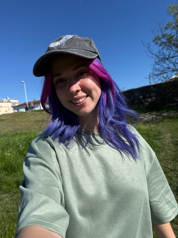 Young woman documents sunny afternoon outing in Zagreb with selfies