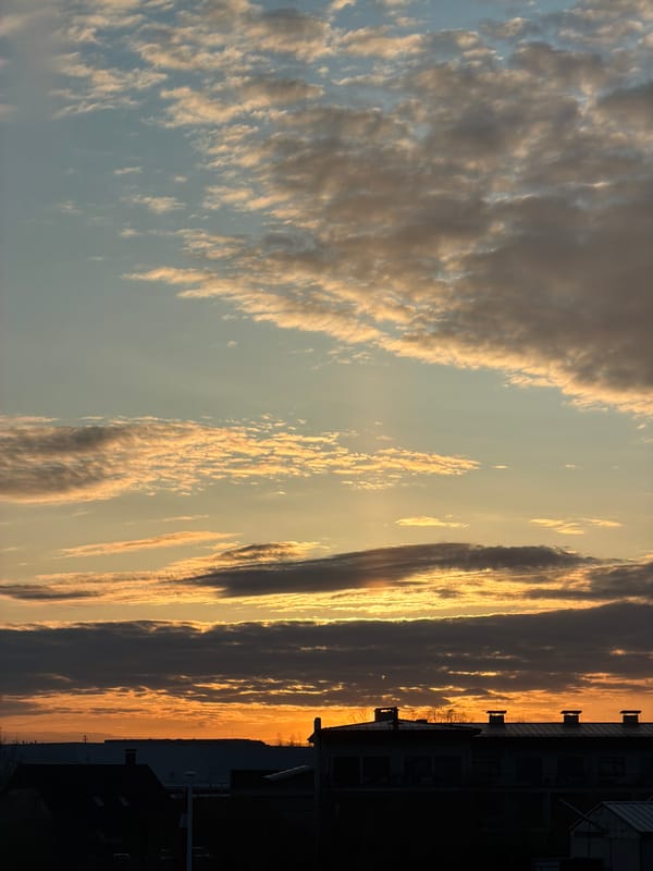 Sunset and playful indoor moment captured in Dreiliņi, Latvia