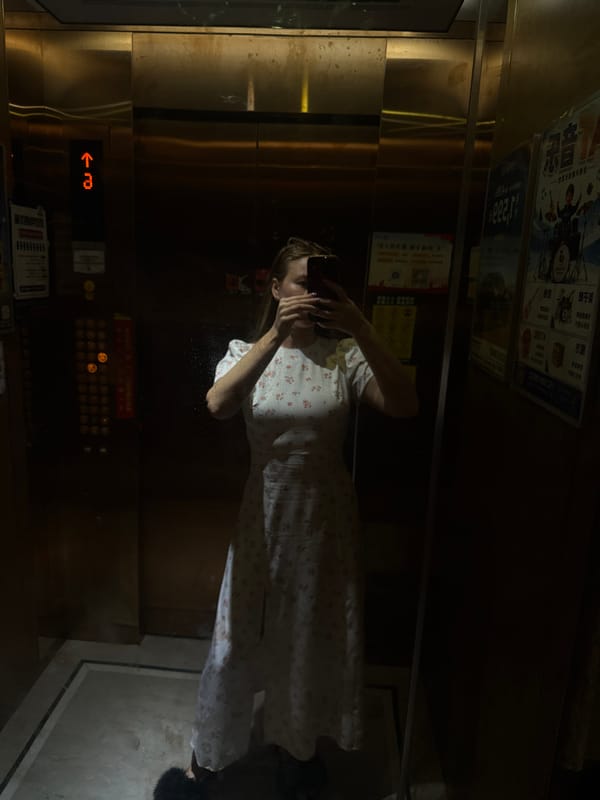 Selfies and street-level moments at a Yiwu residential complex