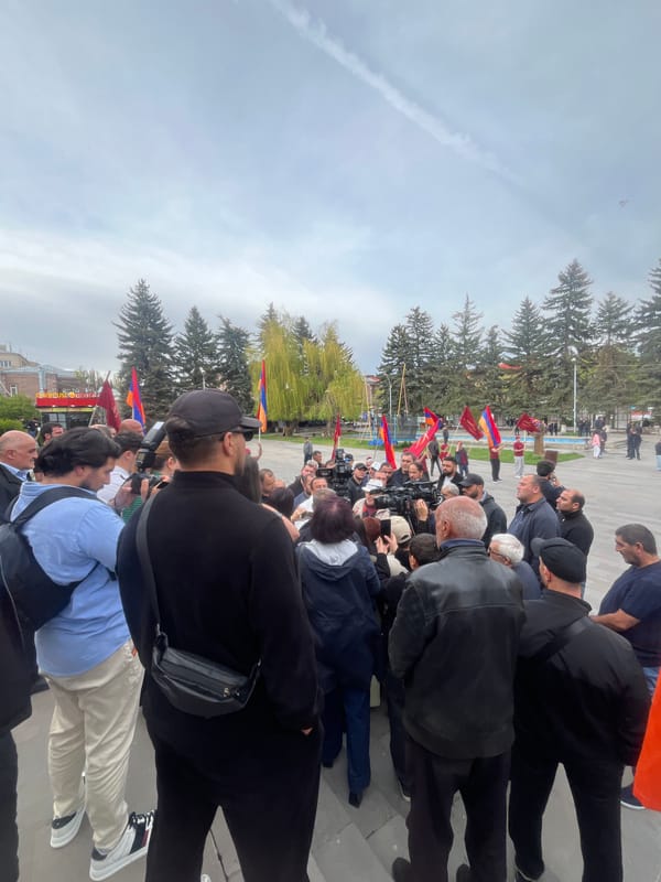 Crowd gathers with Armenian flags in Gyumri city center