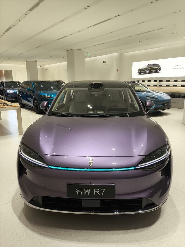 Electric vehicles displayed at Futian District automotive showroom