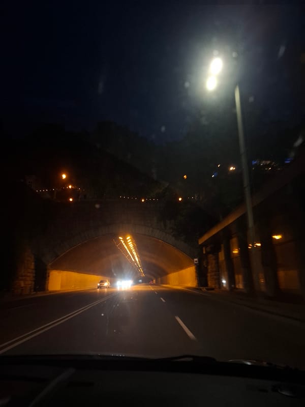 Evening urban journey documented through tunnels, streets, and restaurants