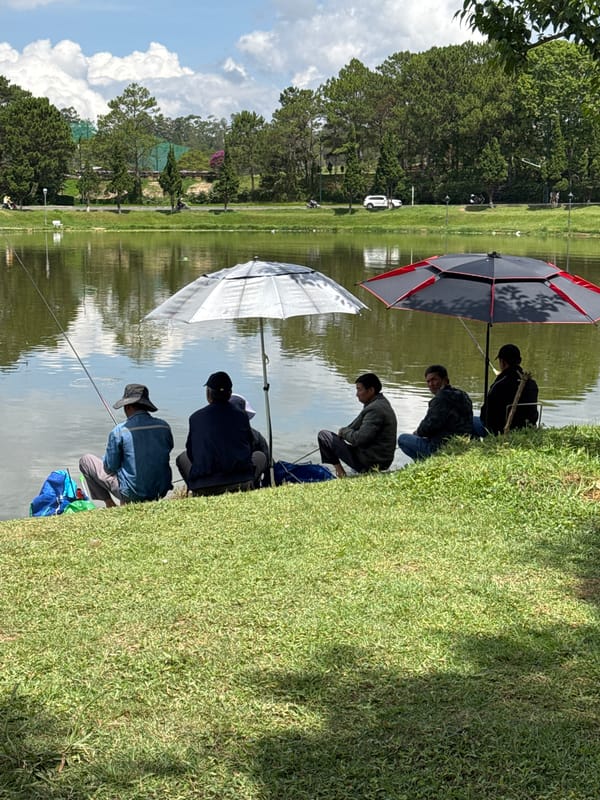Early morning fishing scene captured at Da Lat lake