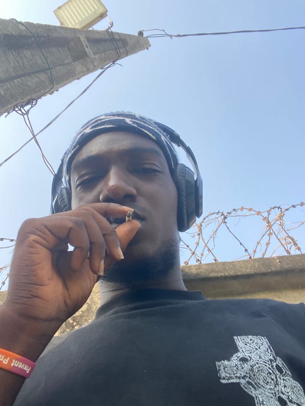 Person observed in grassy area near concrete structures Lagos
