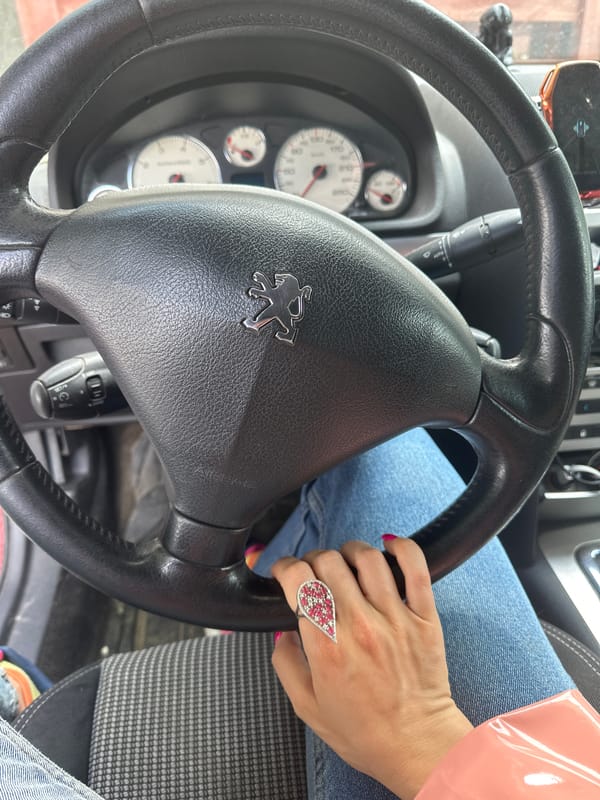Woman photographed in Peugeot driver's seat in Vladimir, Russia