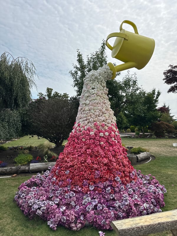 Sculptures, fabric art, and blooms at a Richmond garden