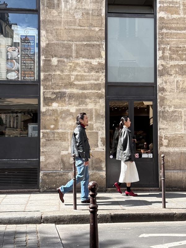 Couple in matching leather jackets spotted on Paris street railings
