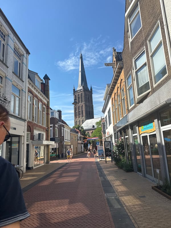 Street-level afternoon in Steenwijk's brick-paved town center