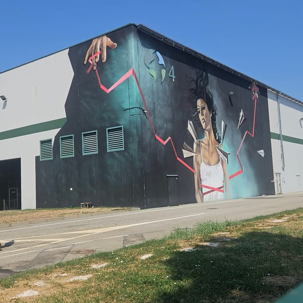 Street murals, a burger truck, and a salvage yard in Somaglia