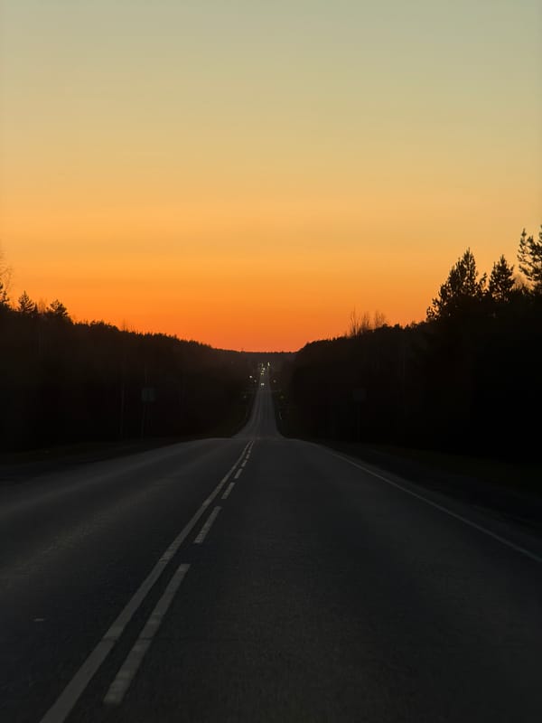 Sunset drive captured on curved road in Chaikovsky, Russia